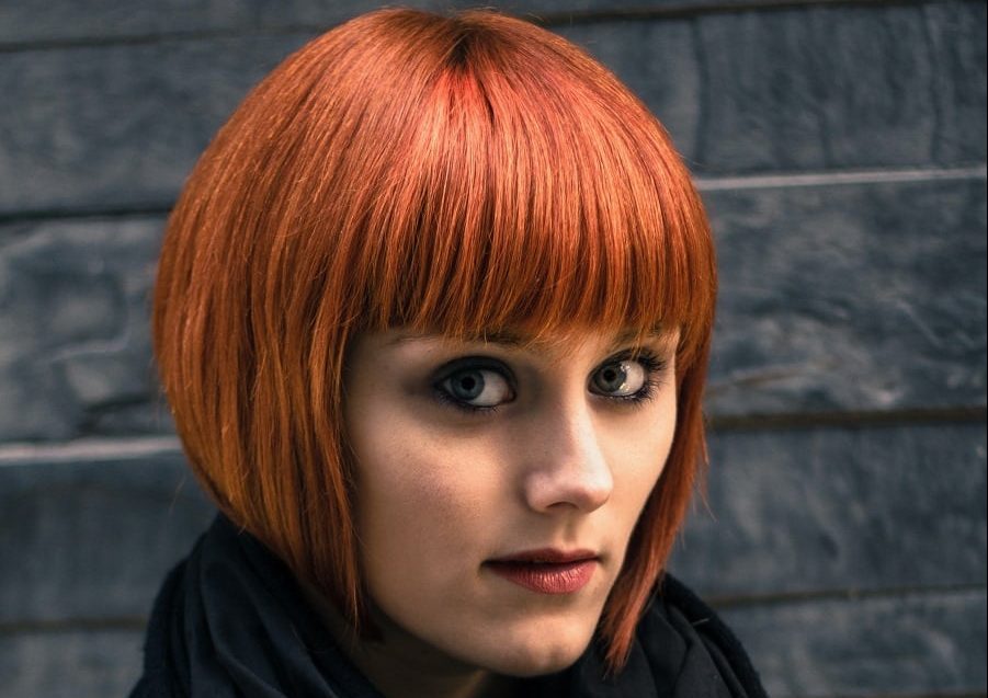 red short bob with thick bangs