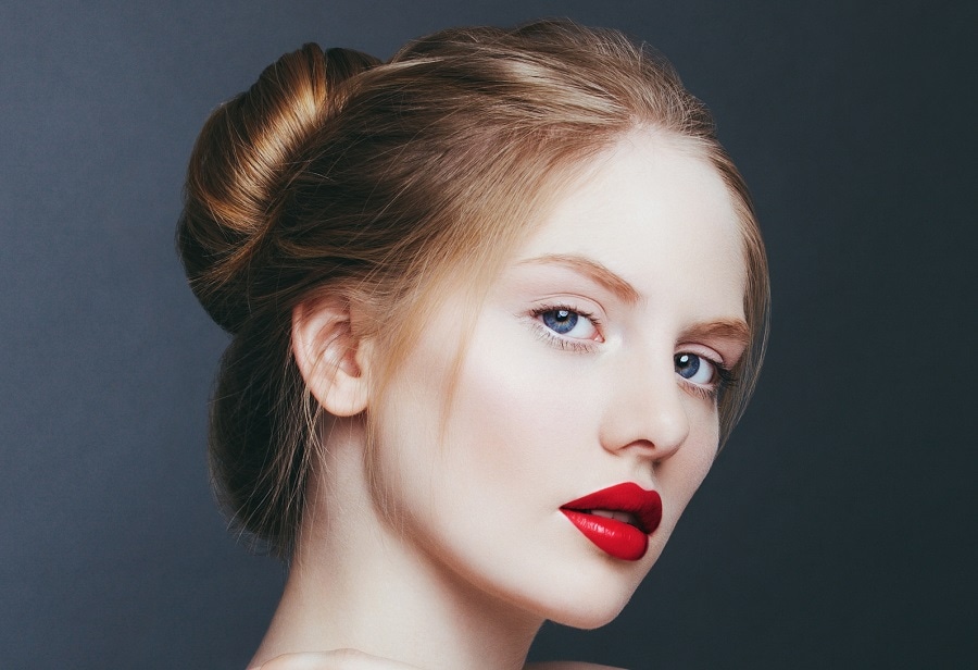 brown hair updo with blue eyes