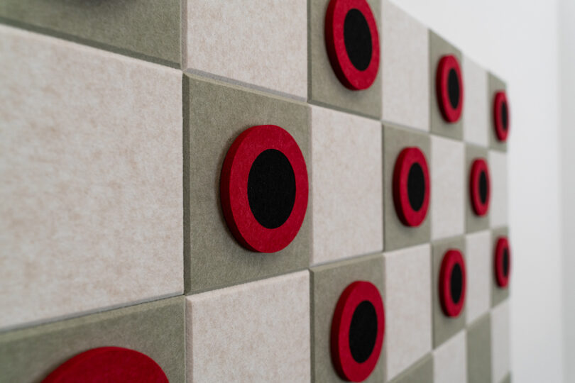 red, white, and grey felt checkers game