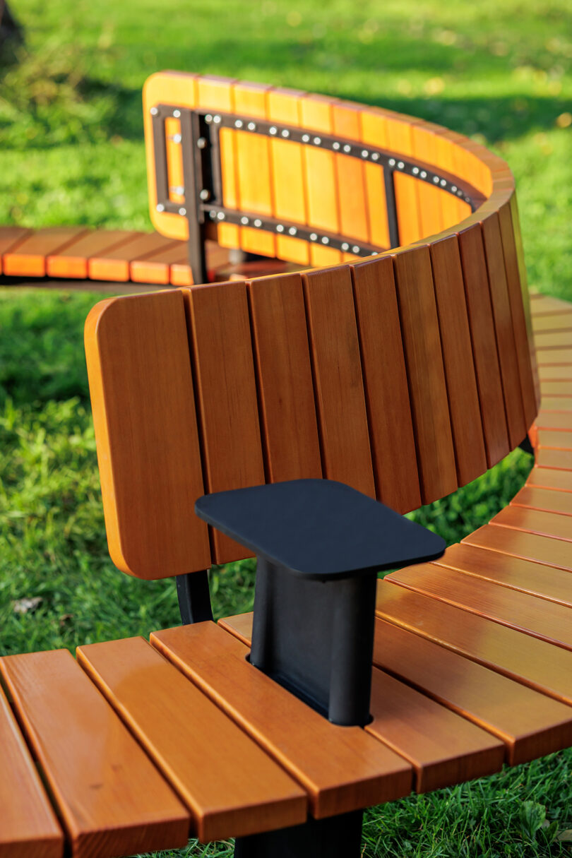 detail of semi-circular wooden bench.