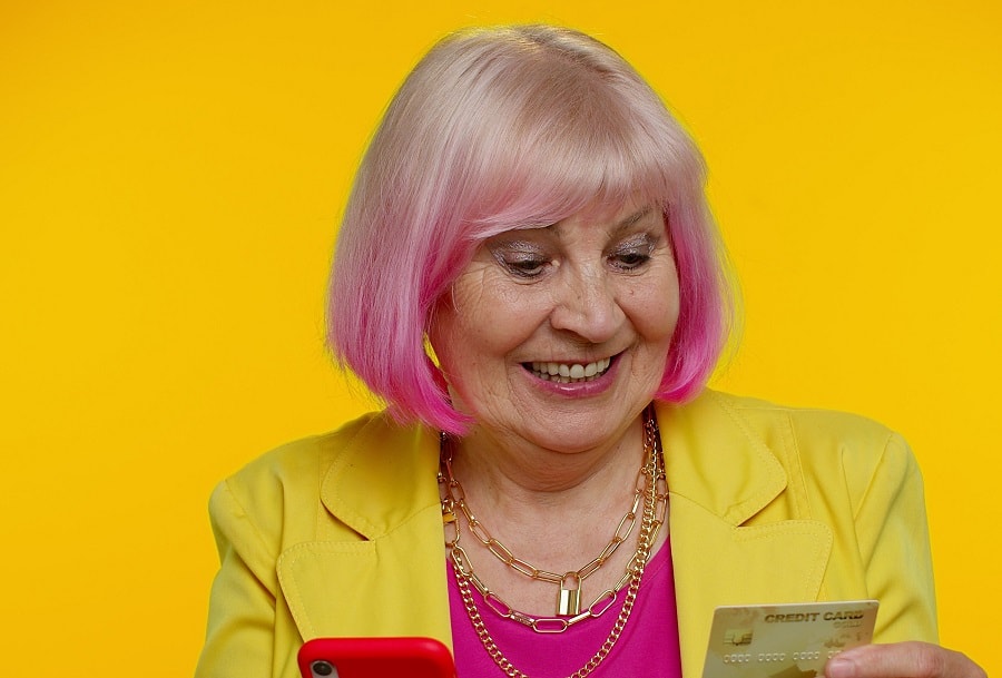 older woman with colored bob hairstyle