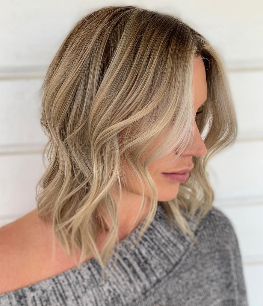 wavy bob with face framing highlights