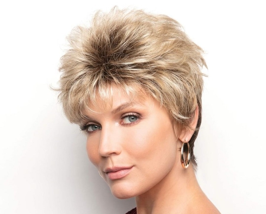 short blonde feathered hair with dark roots