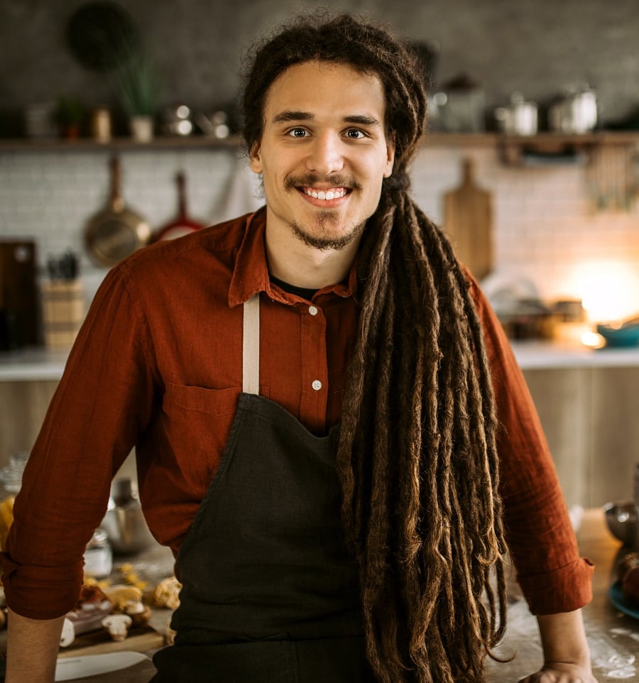 man with dreadlocks ponytail