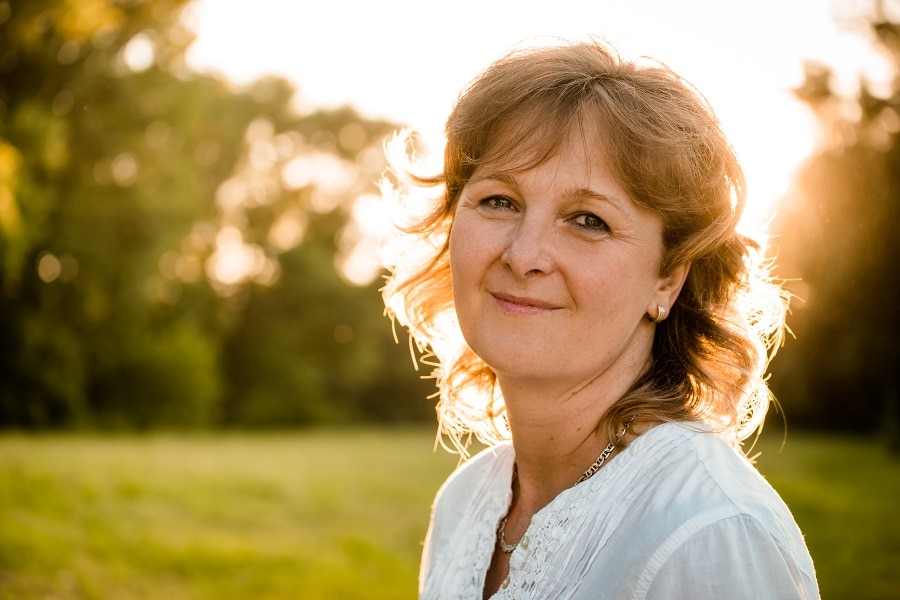 blonde layered hairstyle for women over 50