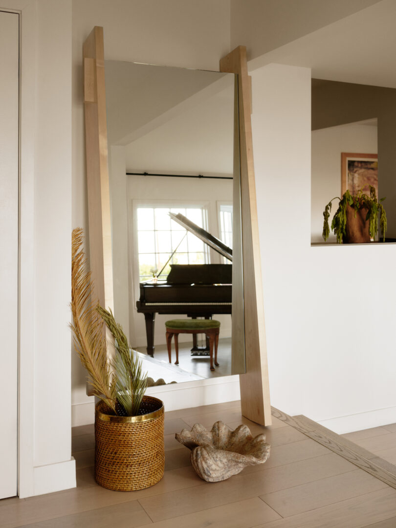 Grand piano reflecting off a mirror