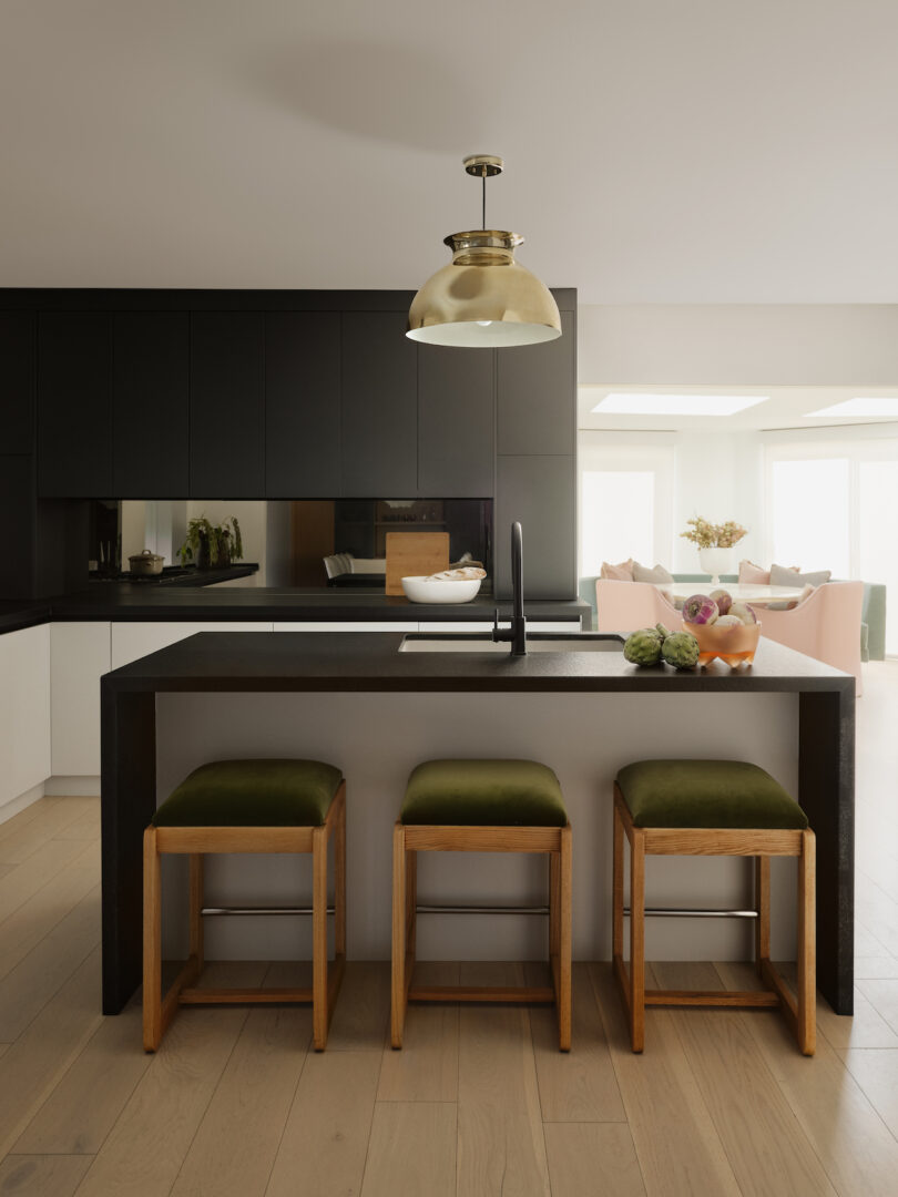 Spacious kitchen area with three barstools