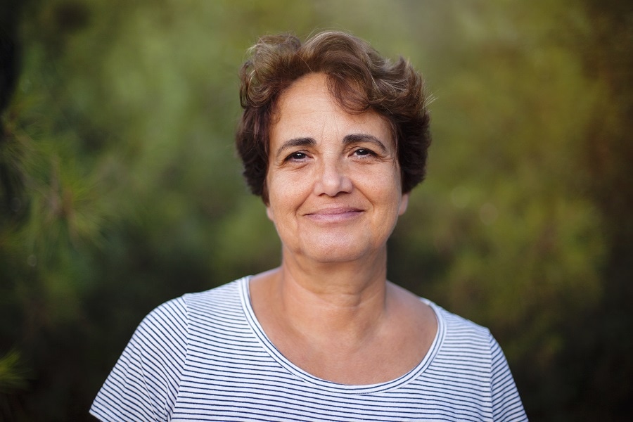 older woman with short thin hair