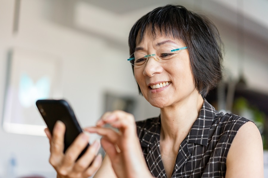 older Asian woman with short hair