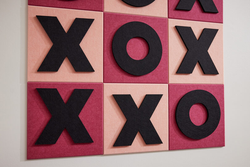 light pink and magenta felt tic tac toe wall game