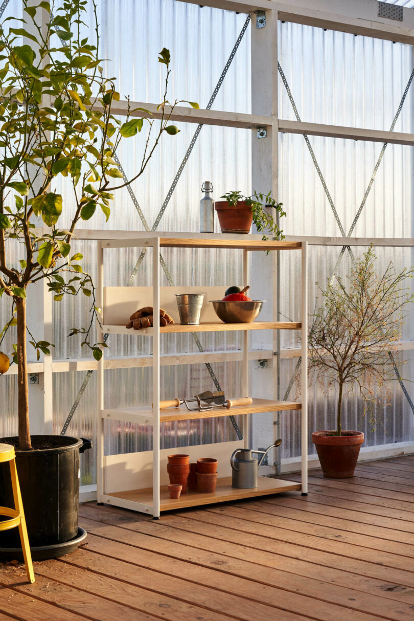 storage shelf with gardening supplies on it