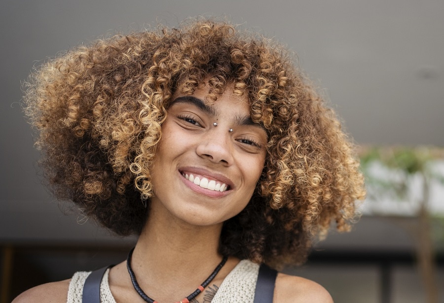 twist out natural hair with blonde highlights