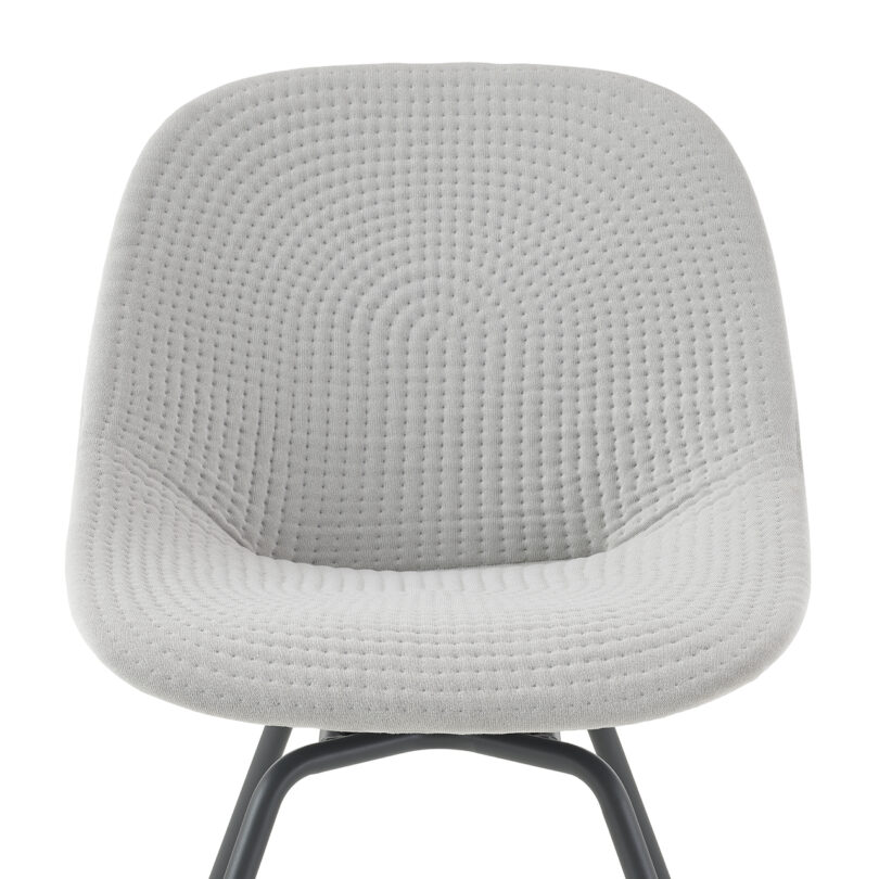 Modern grey fabric chair with a textured seat and backrest, mounted on a simple black metal frame.