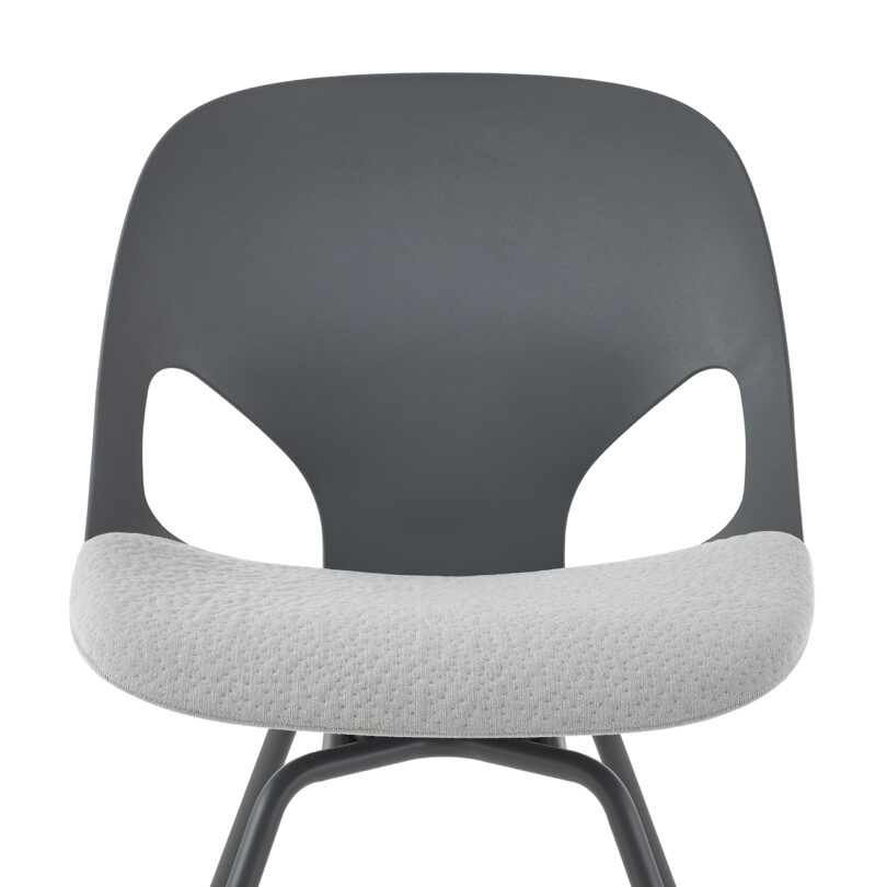 Modern grey chair with a fabric seat and backrest, mounted on a simple black metal frame.