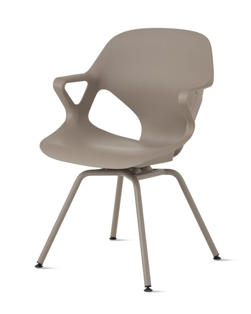 Modern gray designer chair with an ergonomic cut-out design and four steel legs on a white background.