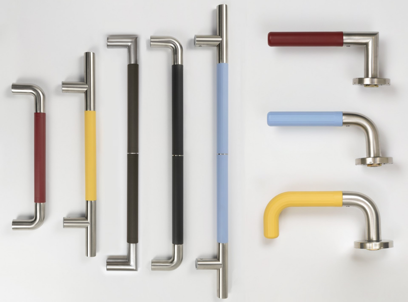 Assorted metal pulls and levers with different colors and configurations displayed on a white background.